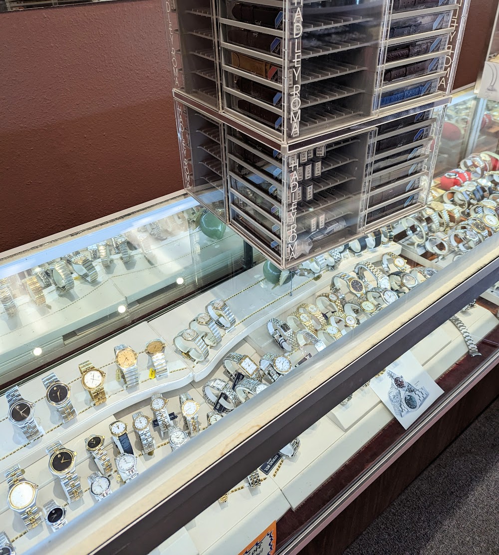 GEMS JEWELRY owners Michael and Sarah providing expert jewelry consultation in their San Diego store